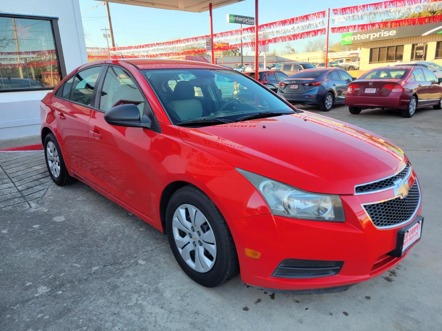 2014 Red Chevrolet Cruze LS Auto (1G1PA5SH8E7) with an 1.8L L4 DOHC 16V FFV engine, 6-Speed Automatic transmission, located at 503 West Court, Seguin, TX, 78155, (830) 379-3373, 29.568621, -97.969803 - Photo#1